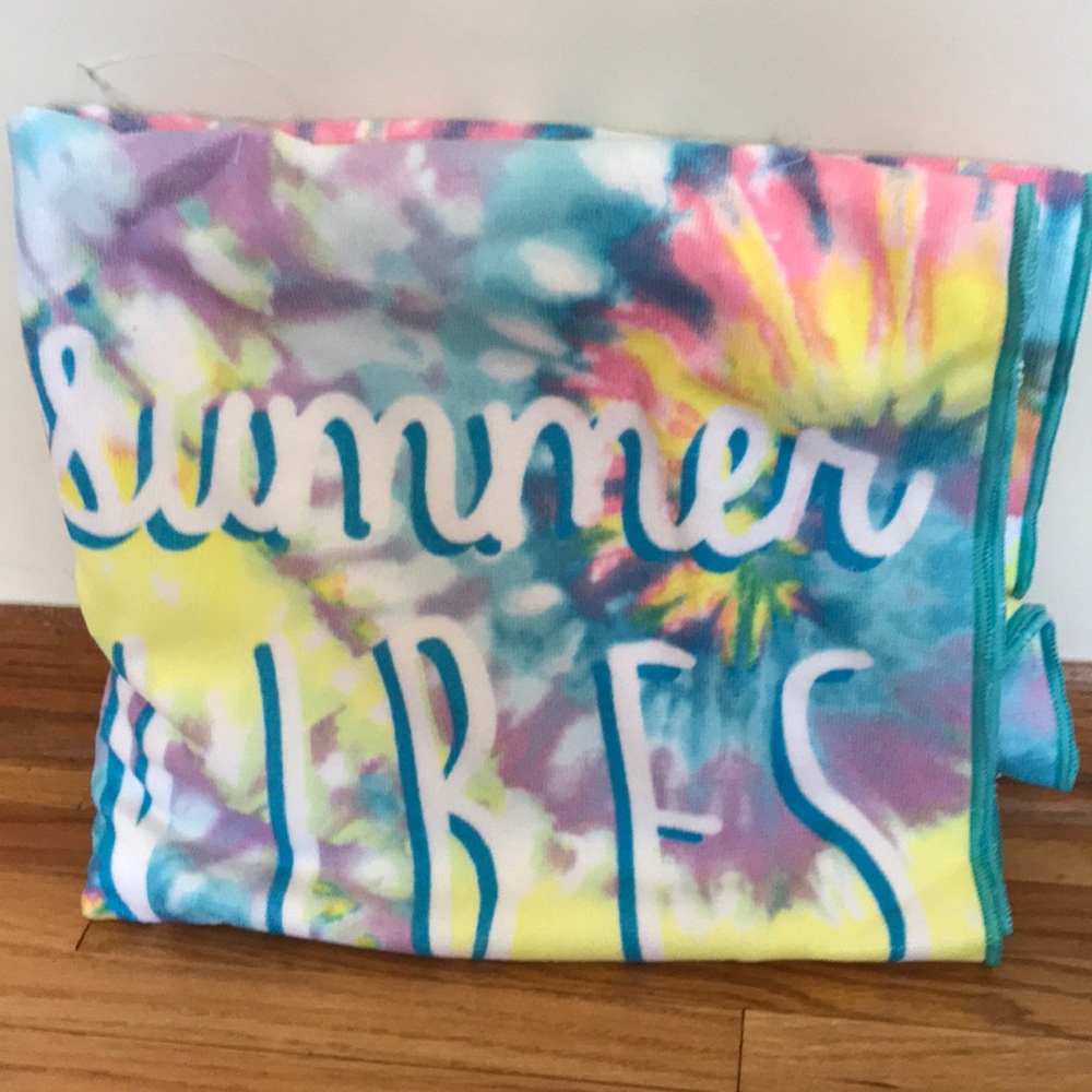 Girl beach towels with sunglasses and clear bag to carry.
